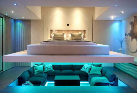 Micro Homes And Small Space Living. DEZEEN (2014) Yo! Home at 100% Design. Dezeen magazine (2012) A master bedroom can be lowered down over the sunken seating area of the living room. Micro Homes And Small Space Living. DEZEEN (2014) Yo! Home at 100% Design. Dezeen magazine (2012) A master bedroom can be lowered down over the sunken seating area of the living room.