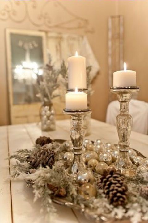 A touch of Christmas: A few key accessories can transform a dining table. Image via: Found on mmgnoveniy.ru A touch of Christmas: A few key accessories can transform a dining table. Image via: Found on mmgnoveniy.ru